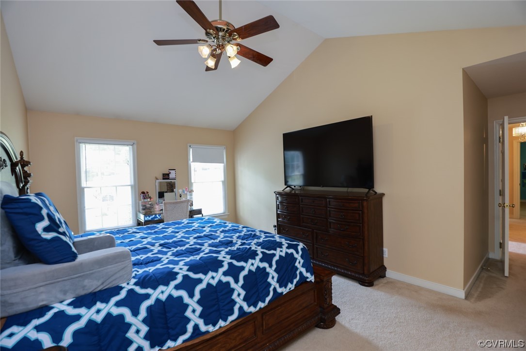 13906 Sagebrook Road Midlothian, VA 23112 - Photo 21 of 50 a bedroom with a large bed and a flat screen tv