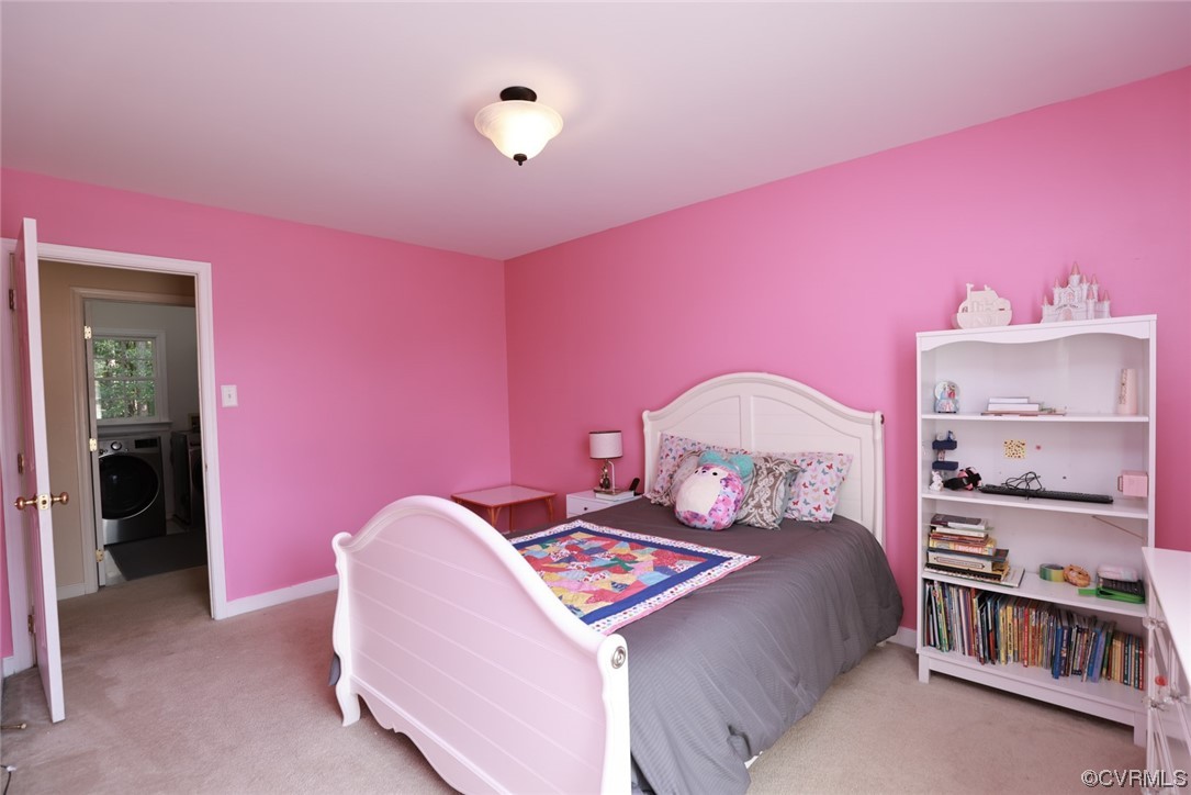 13906 Sagebrook Road Midlothian, VA 23112 - Photo 27 of 50 a bedroom with a bed and a book shelf