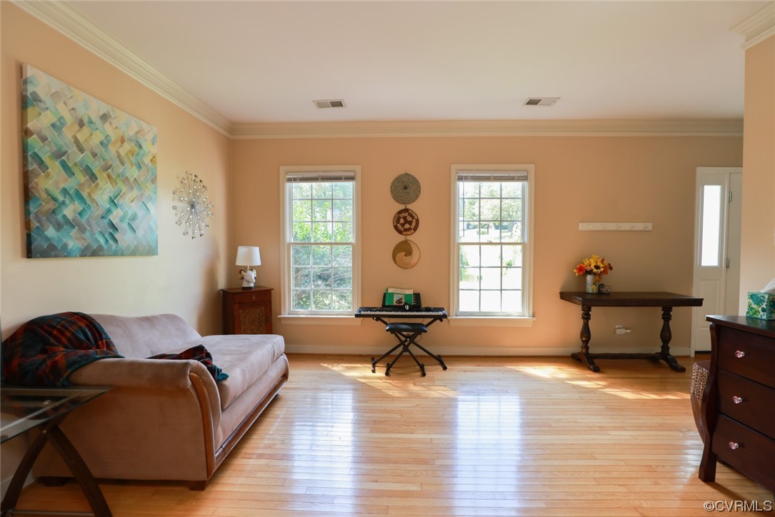 13906 Sagebrook Road Midlothian, VA 23112 - Photo 4 of 50 a living room with furniture and a large window