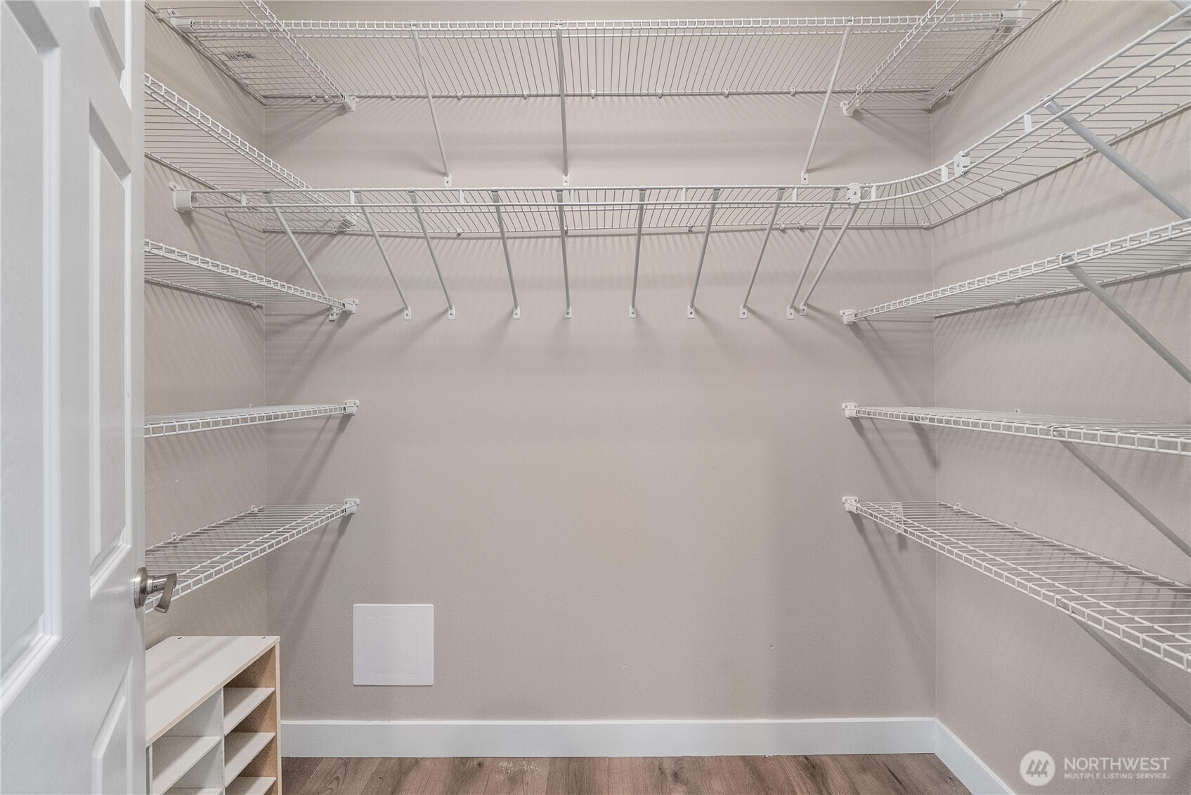 61 East Brady Loop Allyn, WA 98524 - Photo 17 of 27 a view of a room with racks on the wall