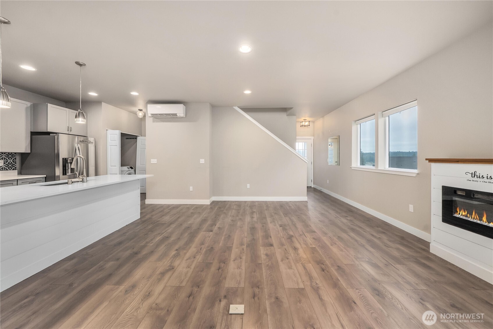 61 East Brady Loop Allyn, WA 98524 - Photo 3 of 27 a view of kitchen with furniture and wooden floor