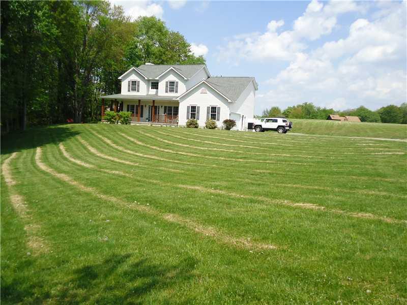 152 Hanny Beaver Road Hookstown, PA 15050 - Photo 1 of 25 Exterior Front. Two story home with wrap around porch situated on 2 acres in a private airpark community.