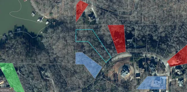 a view of a swimming pool and a yard