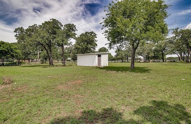 3952 J J Rendon Road Burleson, TX 76028 - Photo 18 of 25 One of the storage buildings surrounded by mature trees.