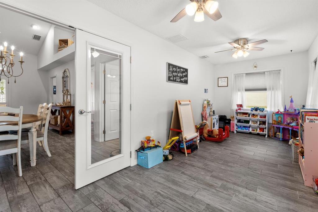 5317 West Tortuga Loop Lecanto, FL 34461 - Photo 21 of 37 a view of a room with gym equipment