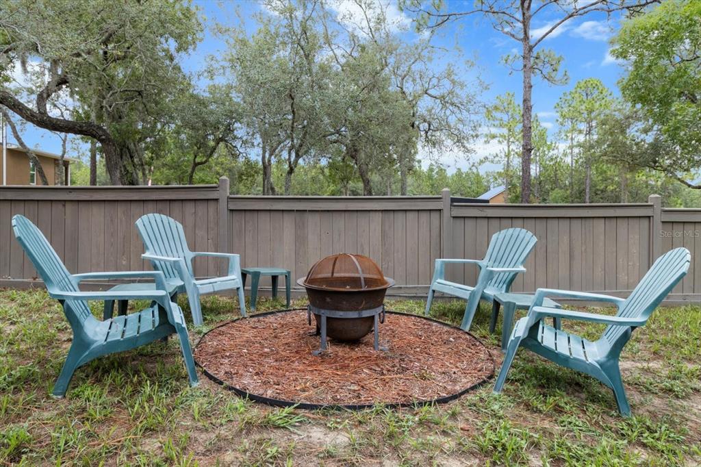 5317 West Tortuga Loop Lecanto, FL 34461 - Photo 28 of 37 a view of a chair and table in the patio