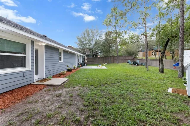 a view of a backyard with a garden
