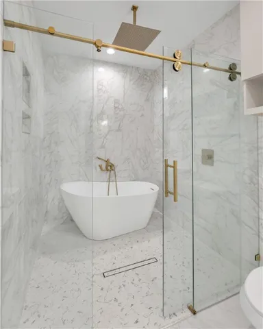 a bathroom with a sink and toilet