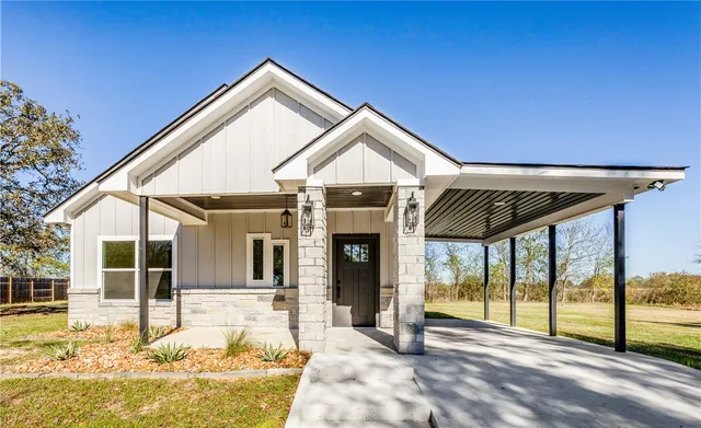 a front view of a house with a porch