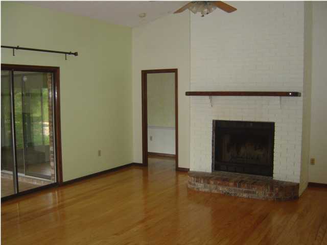 2518 Valley Road Navarre, FL 32566 - Photo 2 of 8 a view of empty room with window and fireplace