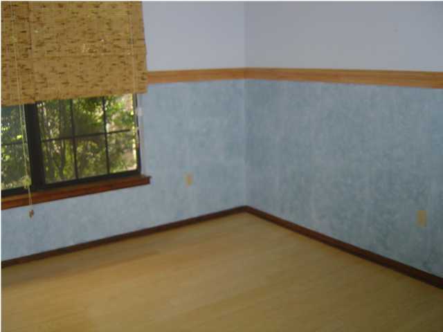 2518 Valley Road Navarre, FL 32566 - Photo 7 of 8 a view of a room with a small yard and a window