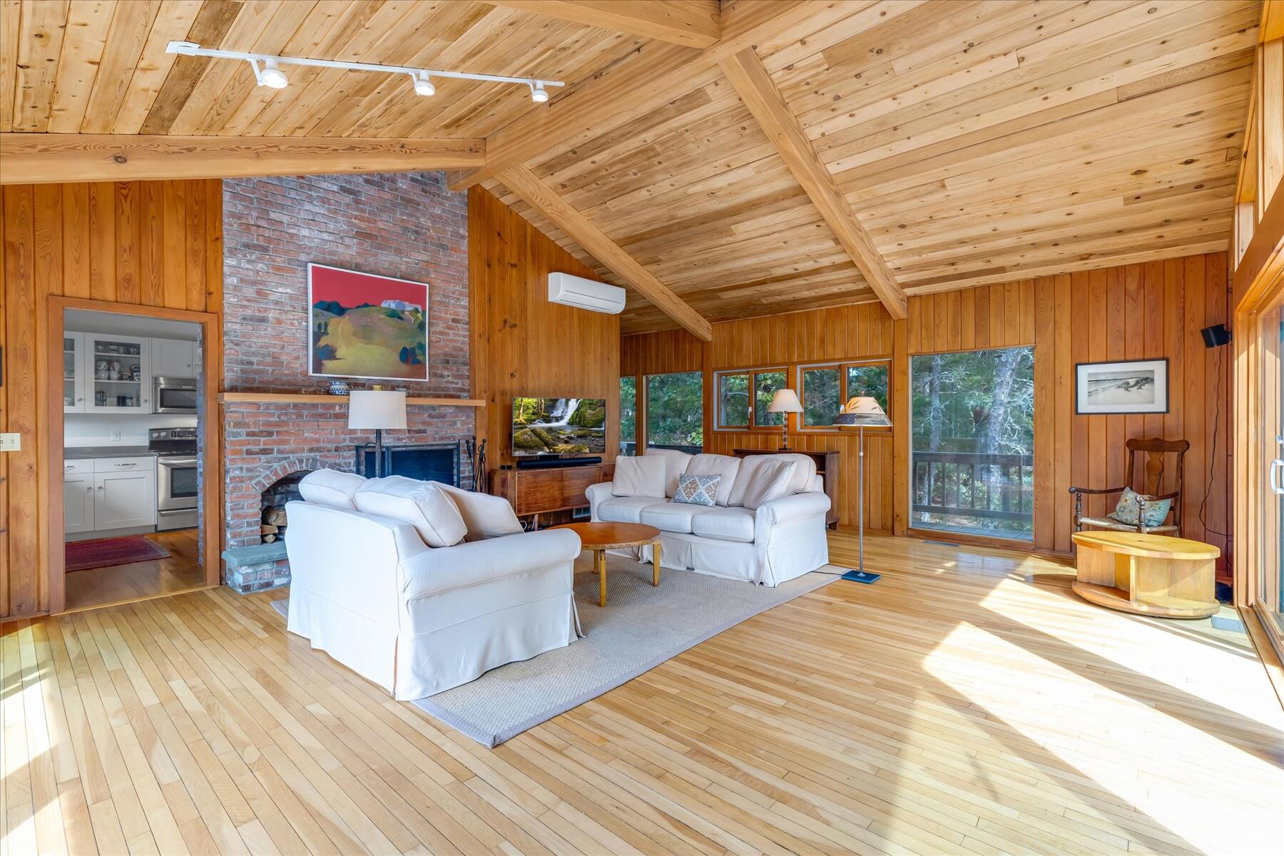 19 Avery Way Truro, MA 02666 - Photo 17 of 50 a outdoor living space with patio furniture and a fireplace