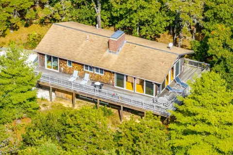 aerial view of a house with swimming pool
