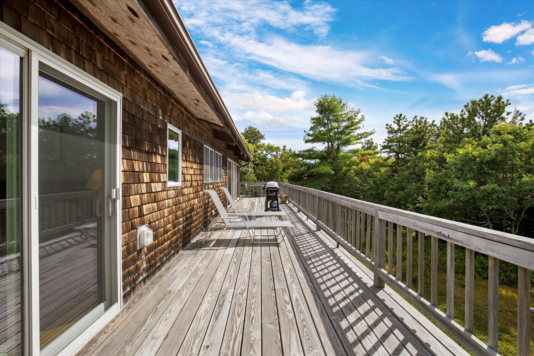 19 Avery Way Truro, MA 02666 - Photo 23 of 50 a view of balcony with wooden floor and fence