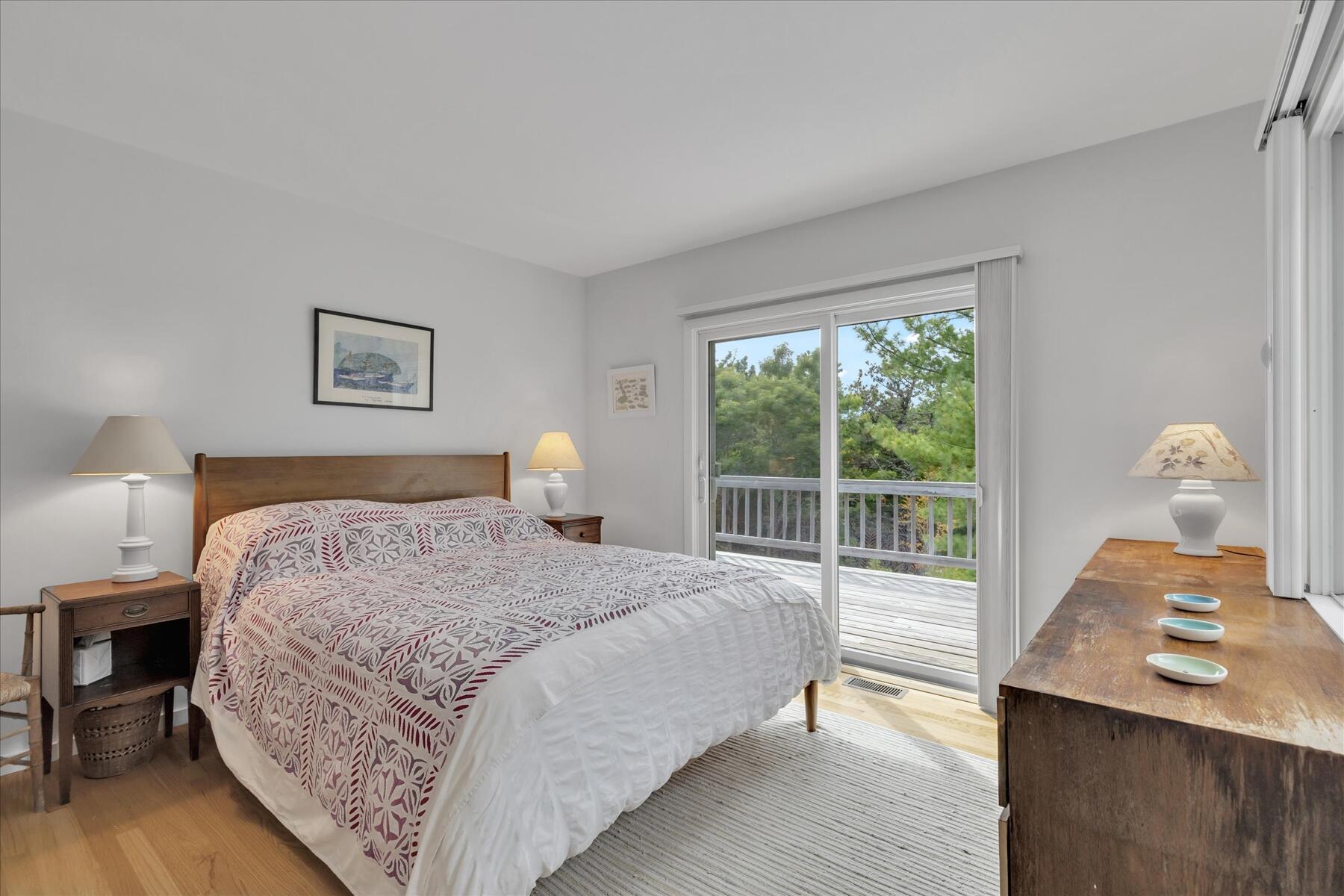 19 Avery Way Truro, MA 02666 - Photo 27 of 50 a bedroom with a bed and window
