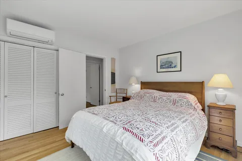 a bathroom with a sink toilet and a mirror