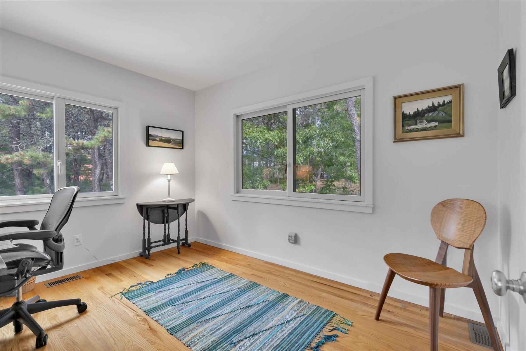 19 Avery Way Truro, MA 02666 - Photo 30 of 50 a living room with furniture and a window