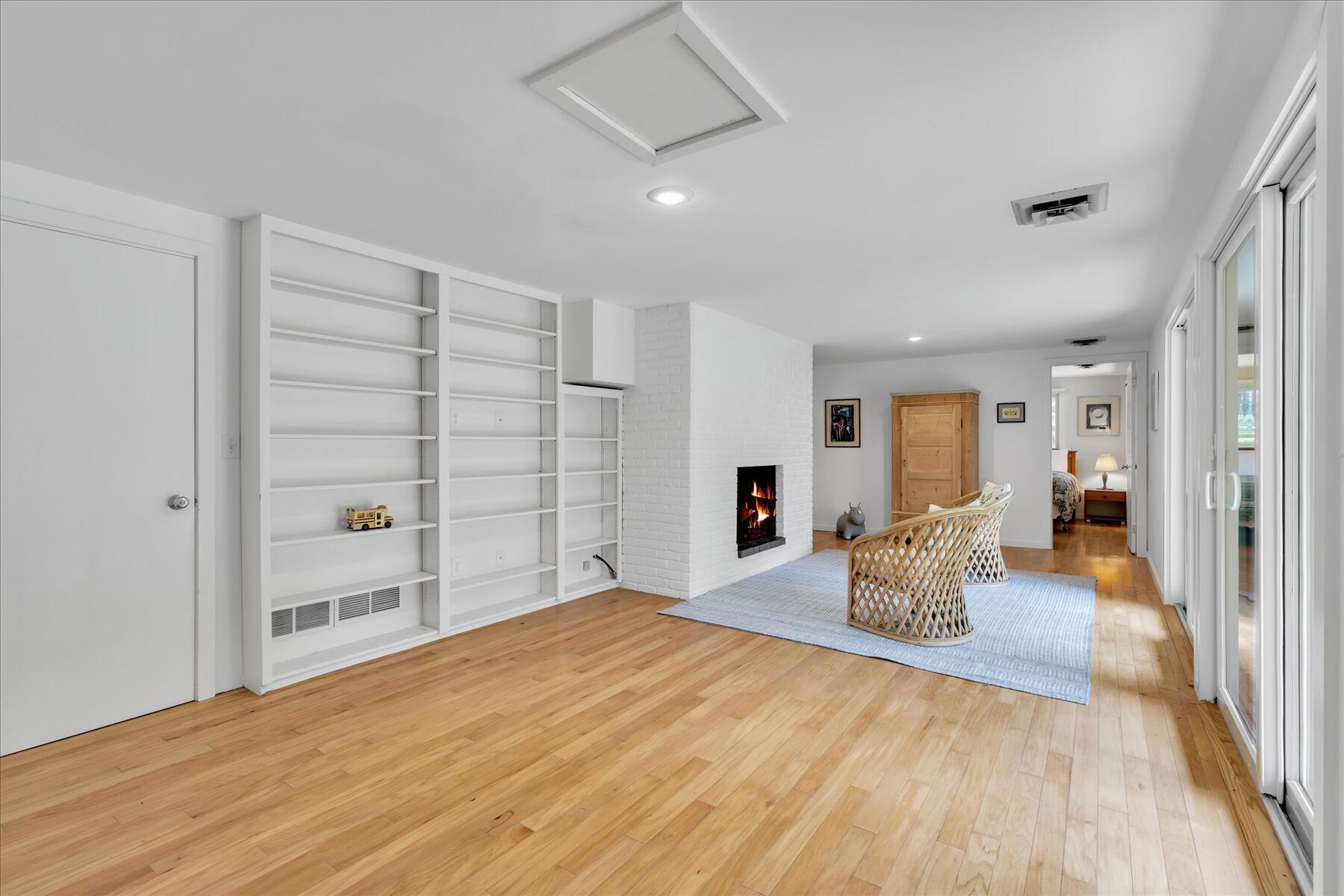 19 Avery Way Truro, MA 02666 - Photo 37 of 50 a very nice looking room with a wooden floor and furniture