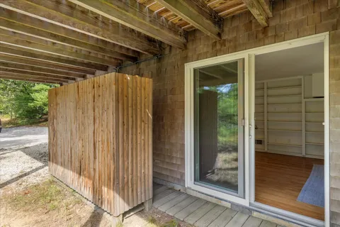 a view of a street with a trees