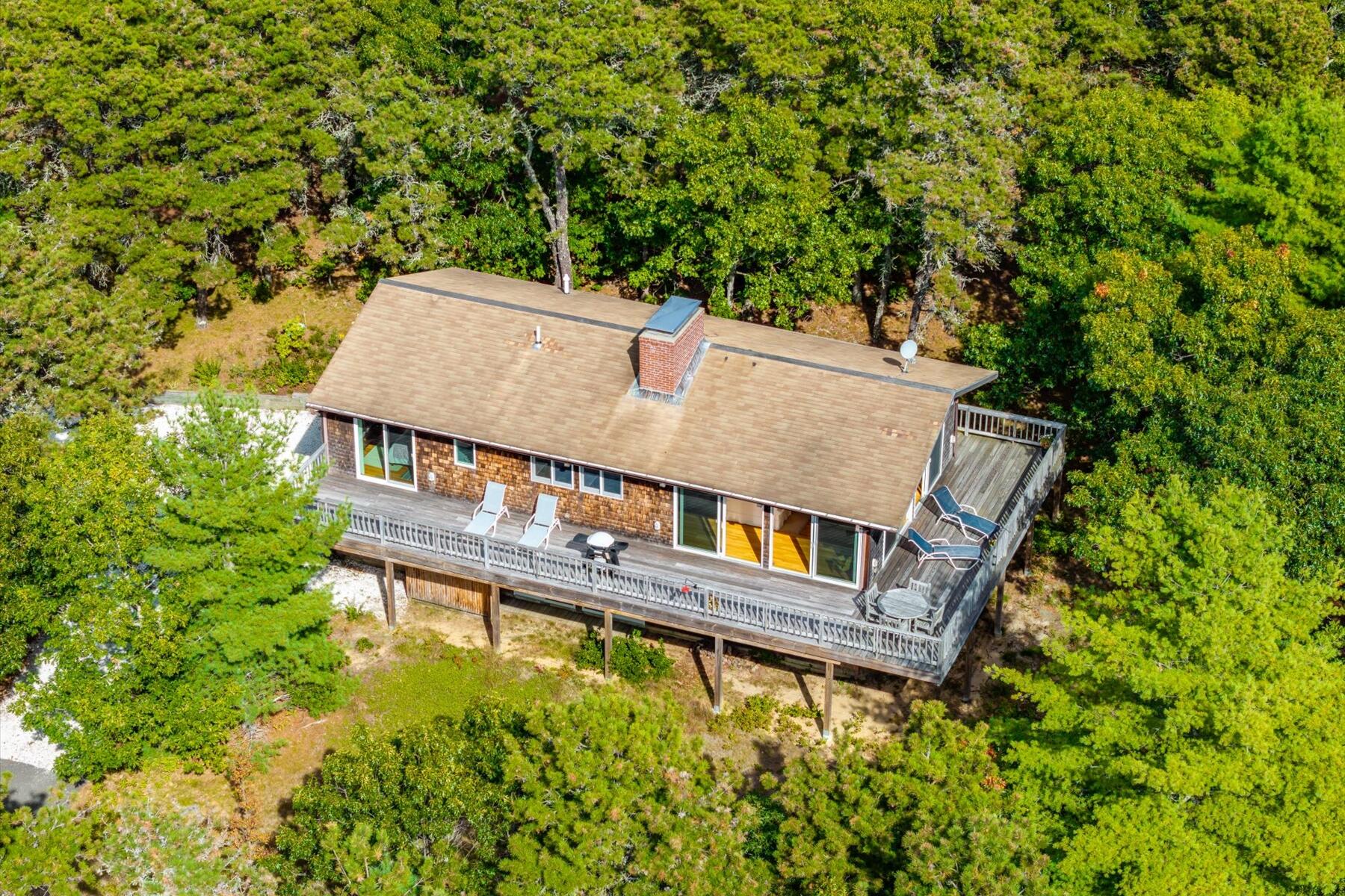 19 Avery Way Truro, MA 02666 - Photo 48 of 50 aerial view of a house with swimming pool