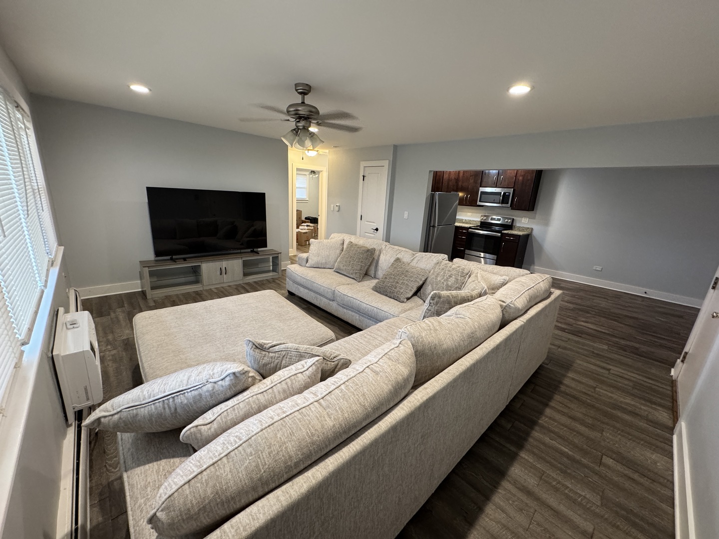 1443 Homestead Road, Unit 2NW La Grange Park, IL 60526 - Photo 2 of 13 a living room with furniture and a flat screen tv