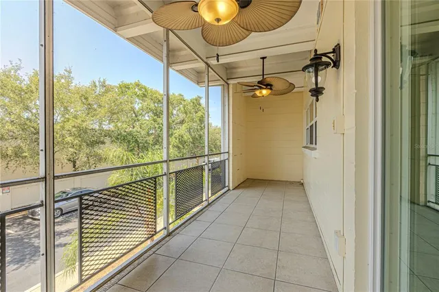 a view of a hallway with a chandelier