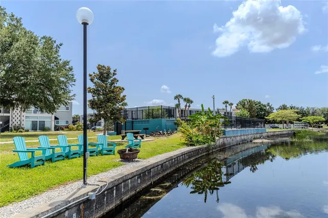 a view of a park with large trees