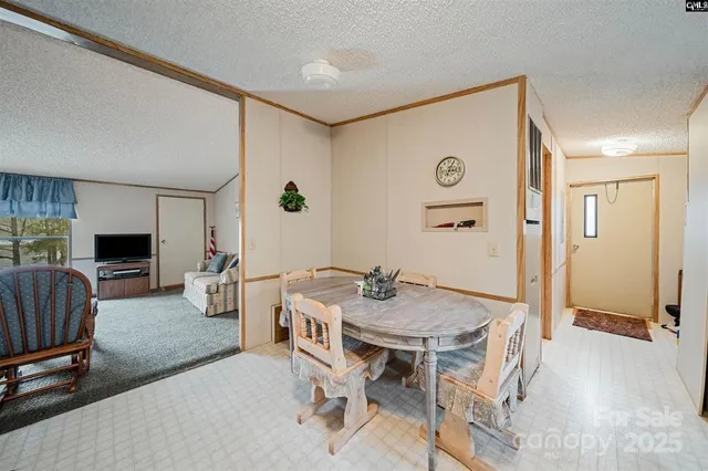 a livingroom with furniture and window