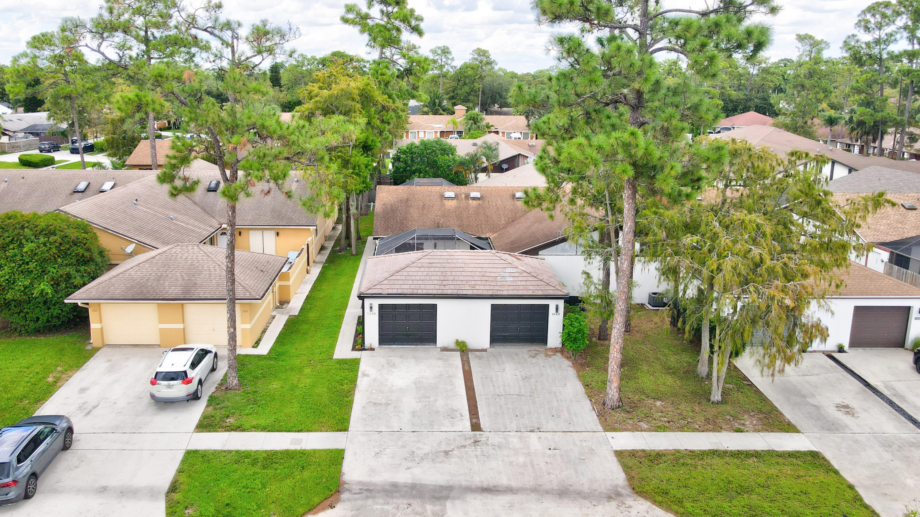 1344 Periwinkle Place Wellington, FL 33414 - Photo 2 of 30 18-print-DJI_0084_5_6_7_8
