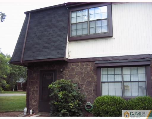 8501 Hana Road Edison, NJ 08817 - Photo 1 of 10 a view of a brick house with a large window