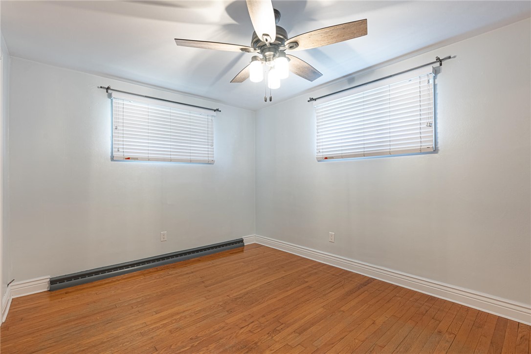 5235 West Ridgewood Road Springfield, OH 45503 - Photo 17 of 32 This bright room features elegant hardwood flooring and natural light through modern window blinds.