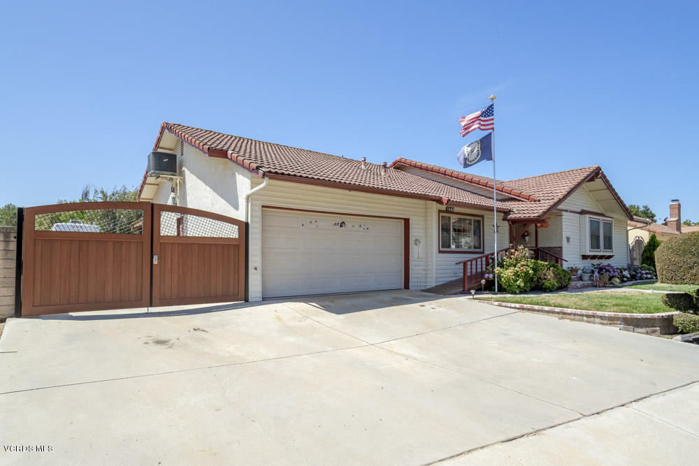 1642 Rambling Road Simi Valley, CA 93065 - Photo 3 of 39 a front view of a house with a garage