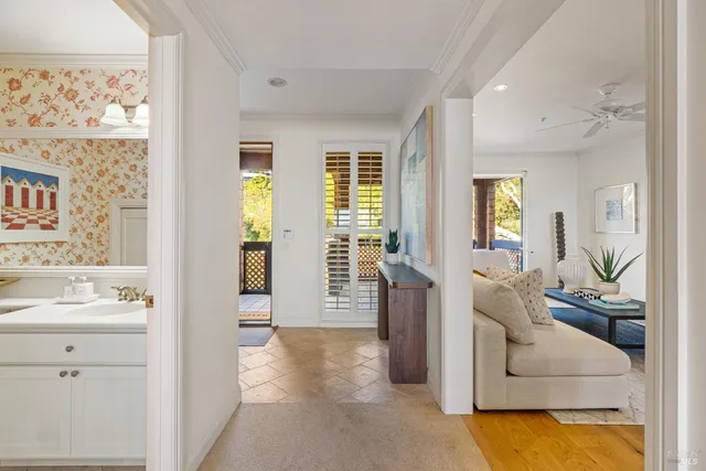 a view of a living room and a large window
