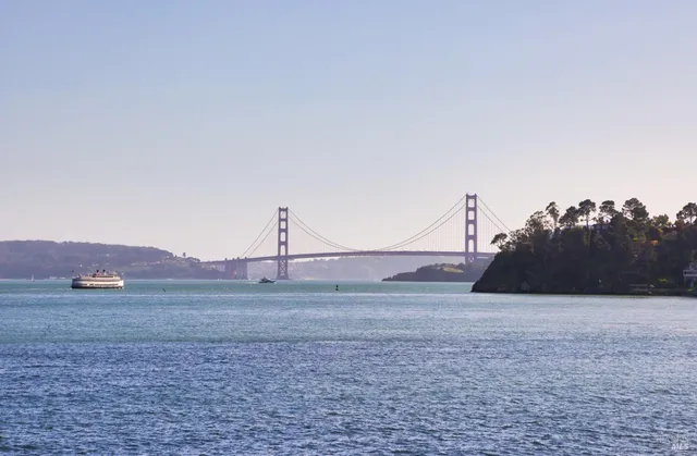 a view of lake with mountain in the background