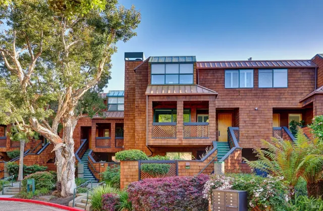 front view of a house with a small yard