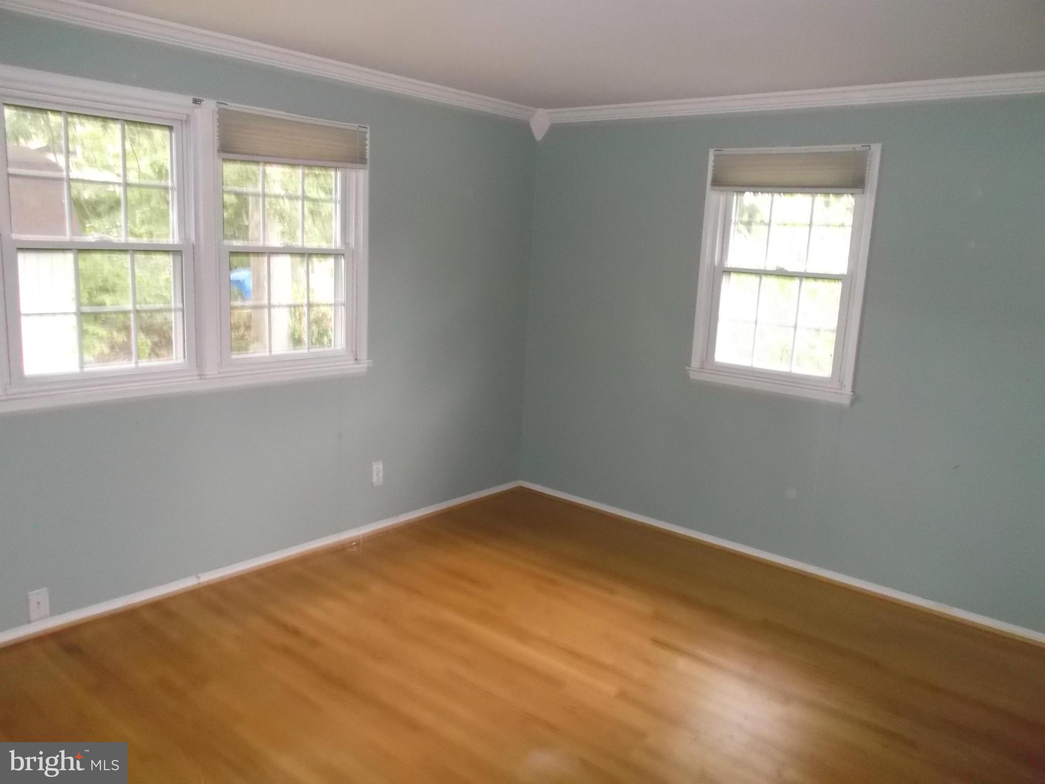 7422 Chatham Street Springfield, VA 22151 - Photo 19 of 30 a view of an empty room with a window