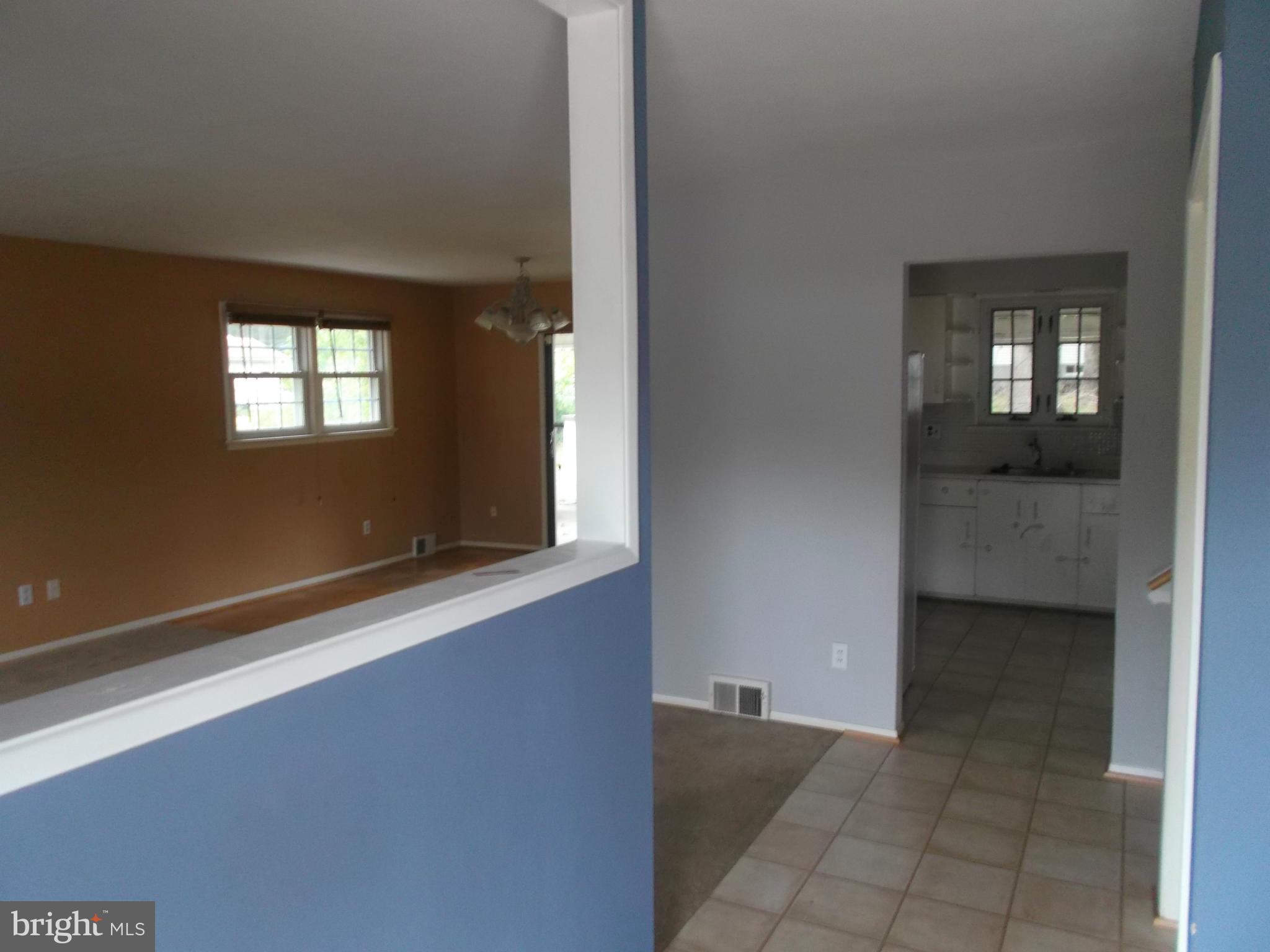 7422 Chatham Street Springfield, VA 22151 - Photo 21 of 30 wooden floor in an empty room with a window