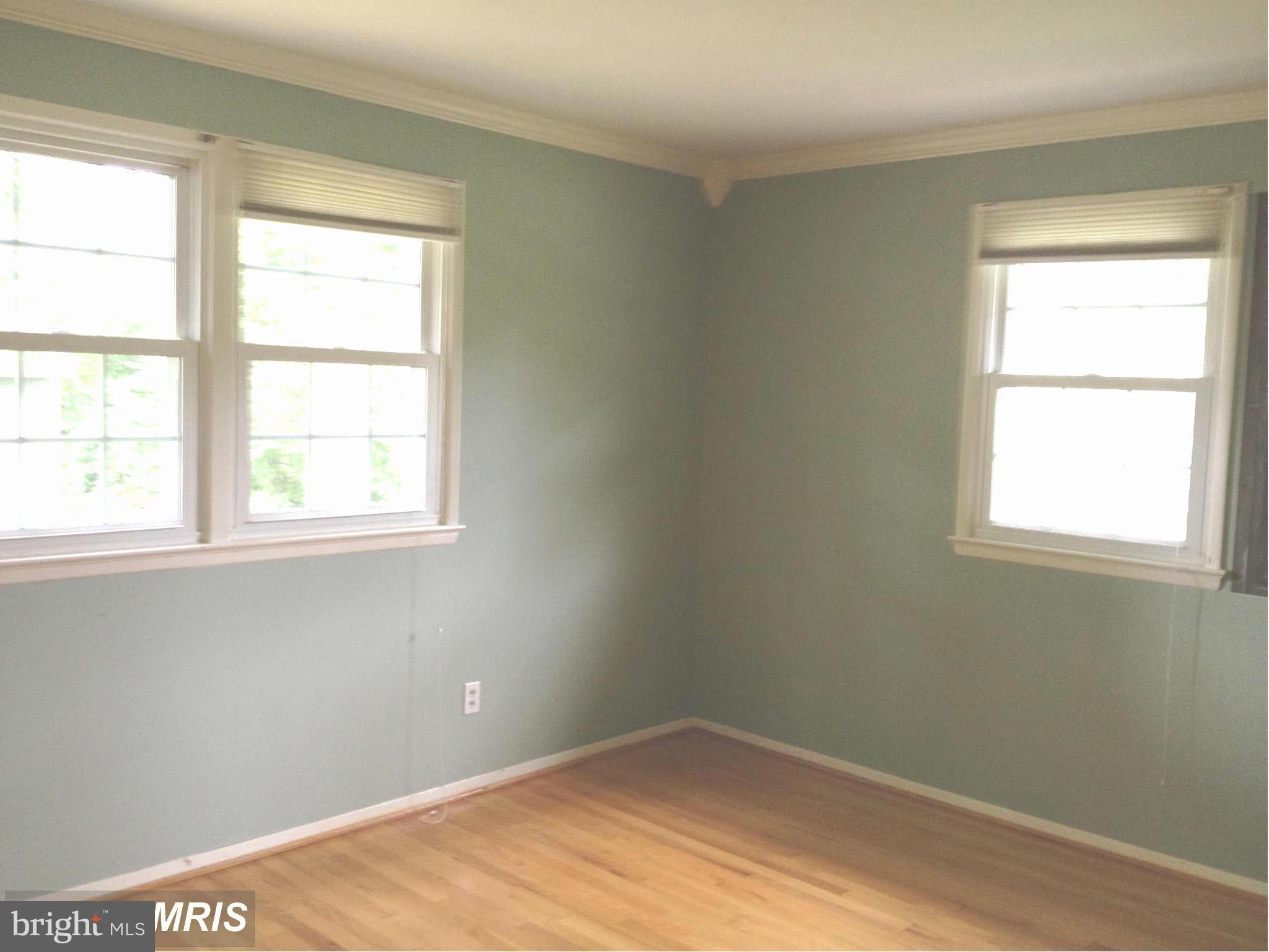 7422 Chatham Street Springfield, VA 22151 - Photo 4 of 30 a view of an empty room with a window