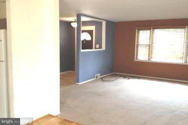 7422 Chatham Street Springfield, VA 22151 - Photo 6 of 30 a view of an empty room with a window