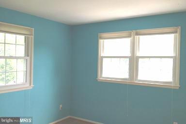 7422 Chatham Street Springfield, VA 22151 - Photo 9 of 30 an empty room with a window