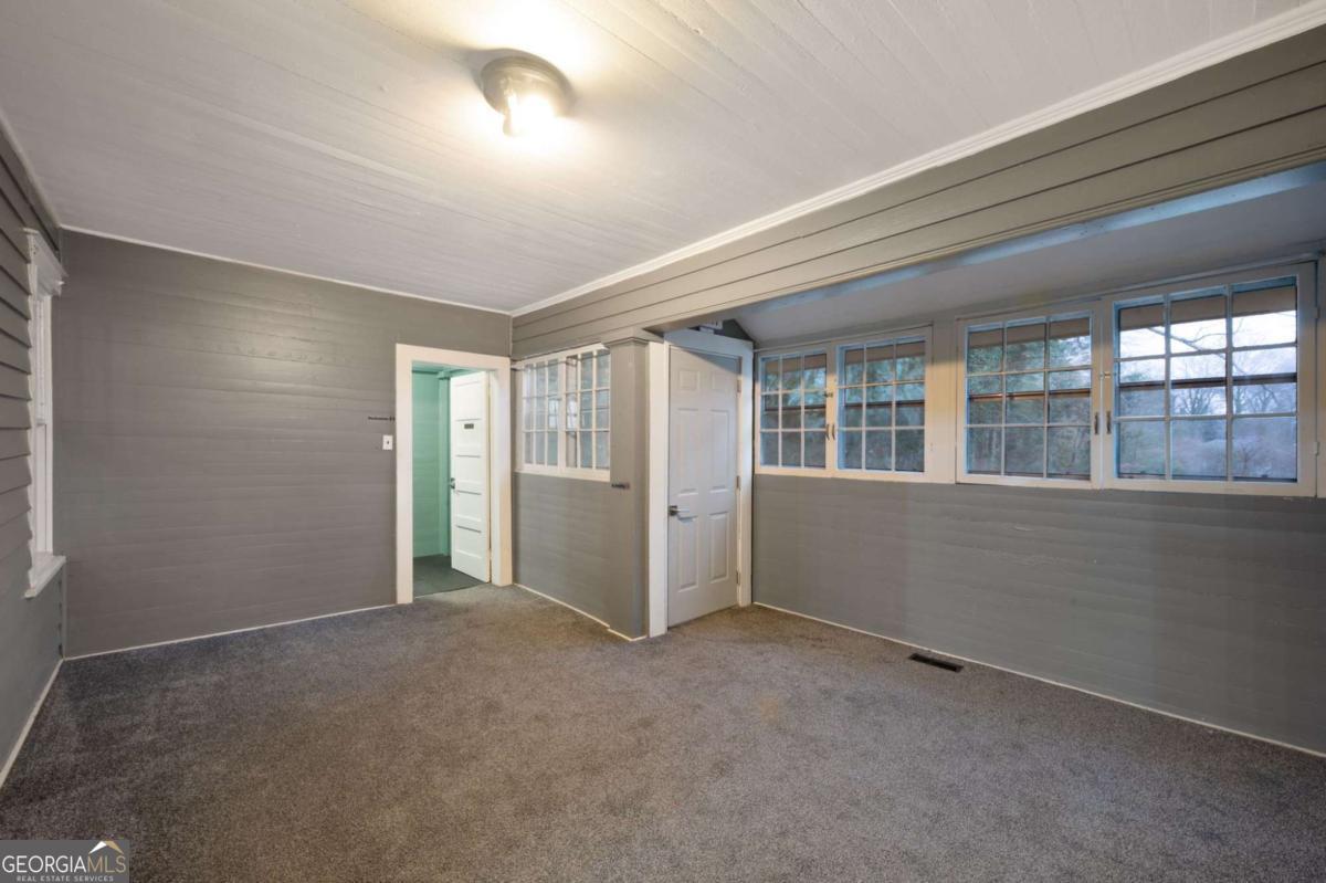 3852 New MacLand Road Powder Springs, GA 30127 - Photo 14 of 23 an empty room with windows