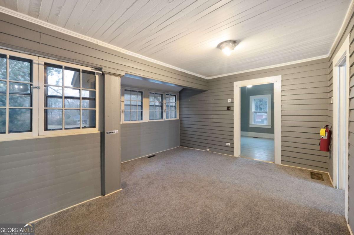 3852 New MacLand Road Powder Springs, GA 30127 - Photo 15 of 23 a view of an empty room with a window