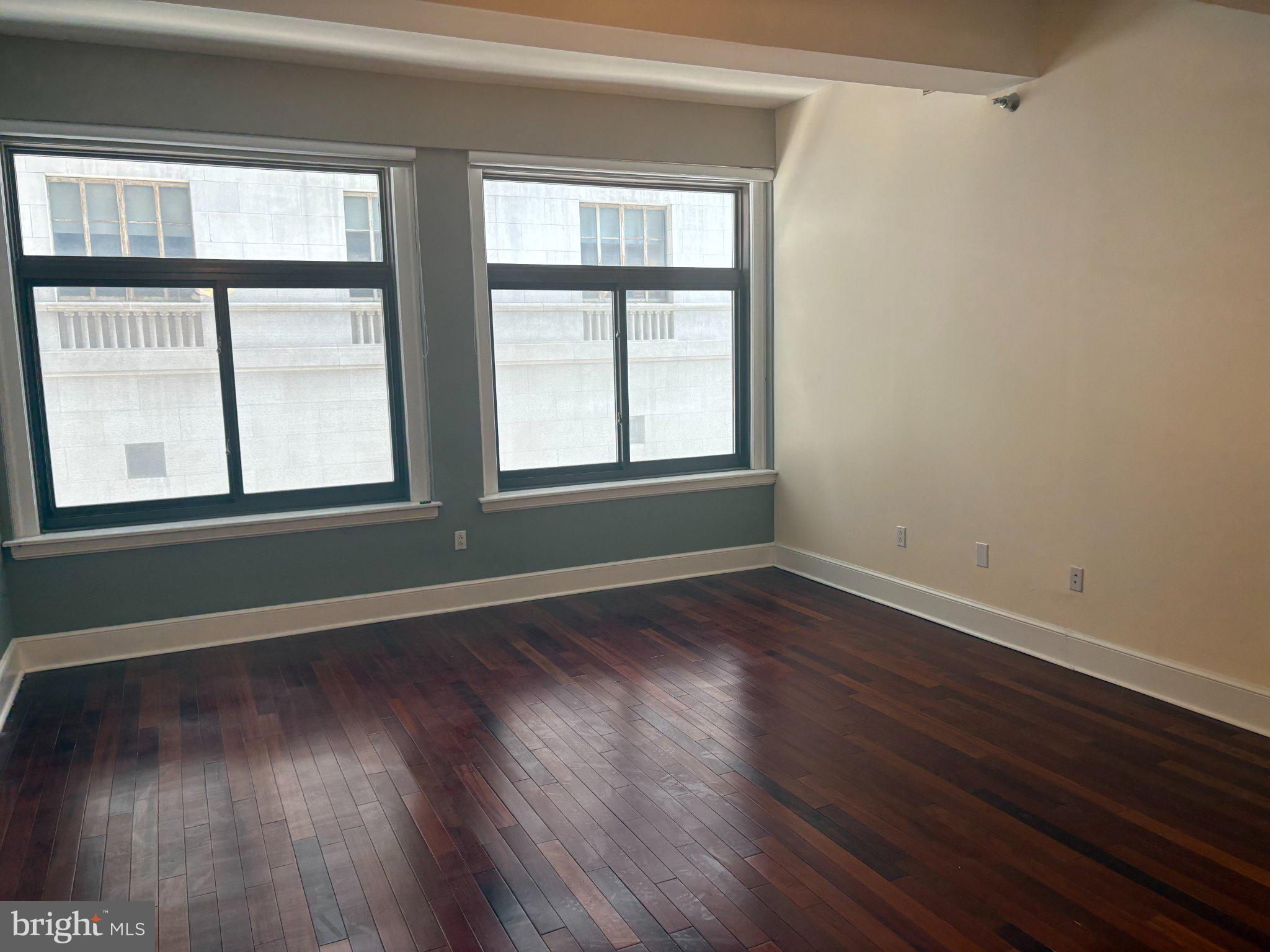 1500 Chestnut Street, Unit 4D Philadelphia, PA 19102 - Photo 19 of 26 Bright, airy space with hardwood floors.