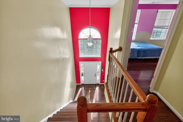 a view of an entryway with a small yard