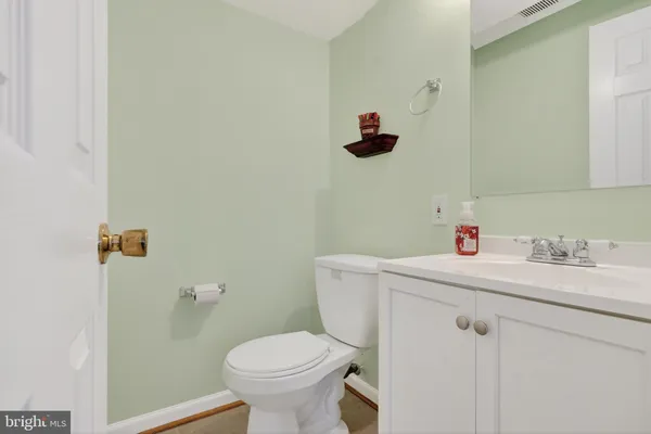 a bathroom with a sink and toilet