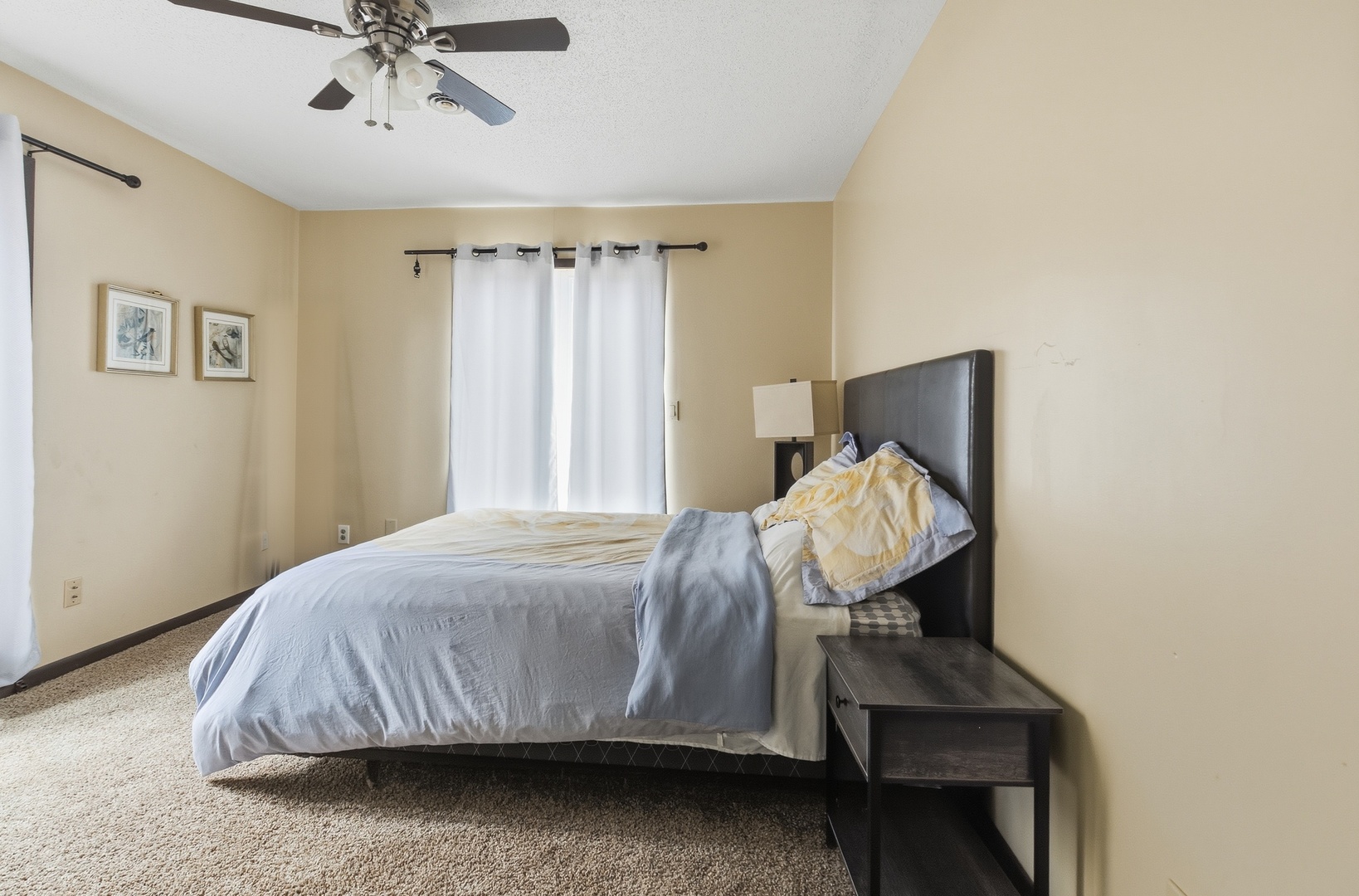 3623 34th Street Moline, IL 61265 - Photo 4 of 22 a bedroom with a bed and chair