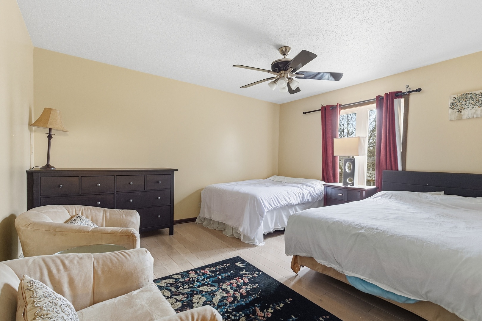 3623 34th Street Moline, IL 61265 - Photo 7 of 22 a bedroom with a bed and wooden floor