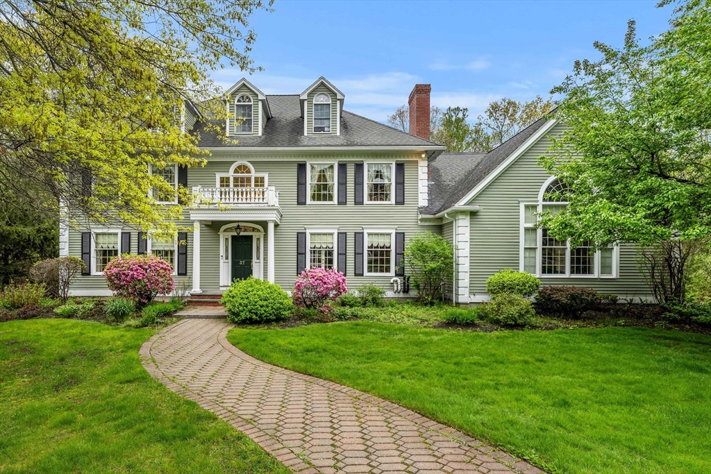 37 Old Planters Road Beverly, MA 01915 - Photo 1 of 42 a front view of house with yard and green space