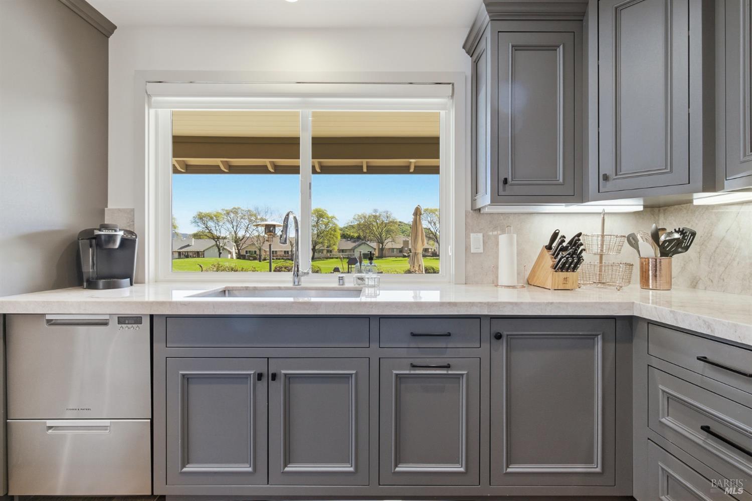 334 Miramonte Way Santa Rosa, CA 95409 - Photo 13 of 46 a sink with a window and cabinets