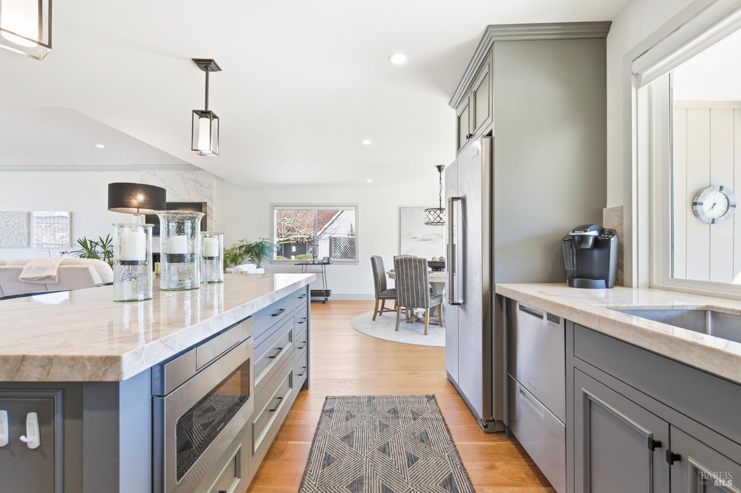 334 Miramonte Way Santa Rosa, CA 95409 - Photo 16 of 46 a open kitchen with stainless steel appliances granite countertop a lot of counter space and wooden floors